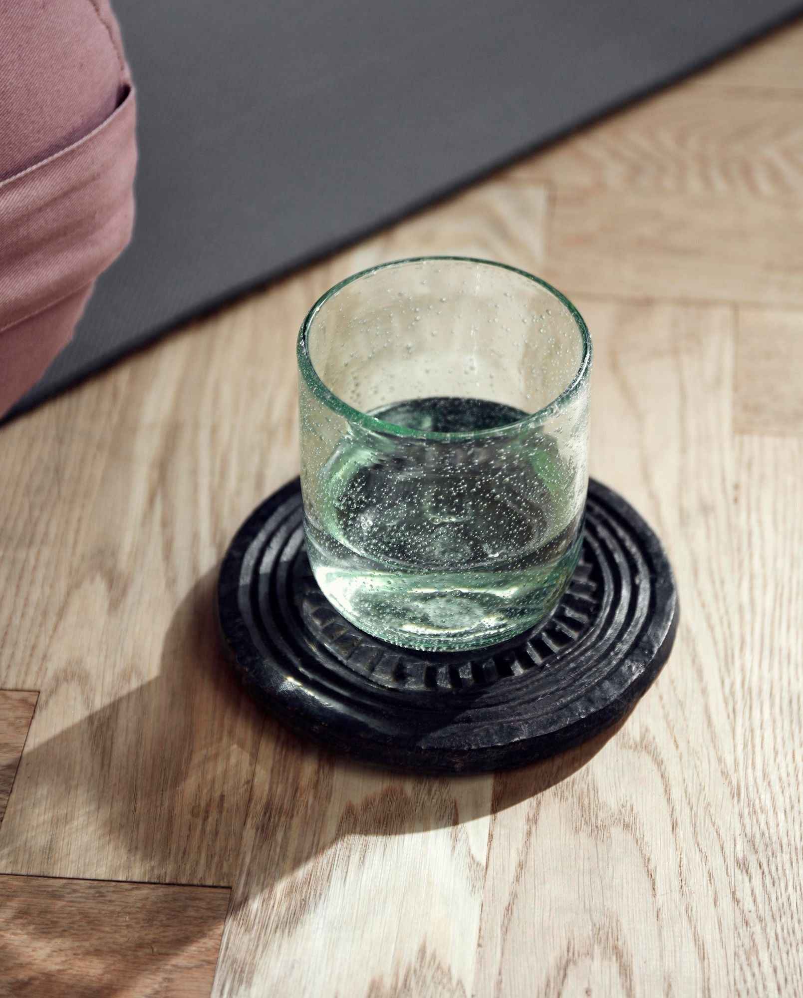 STONE coaster, round, carved