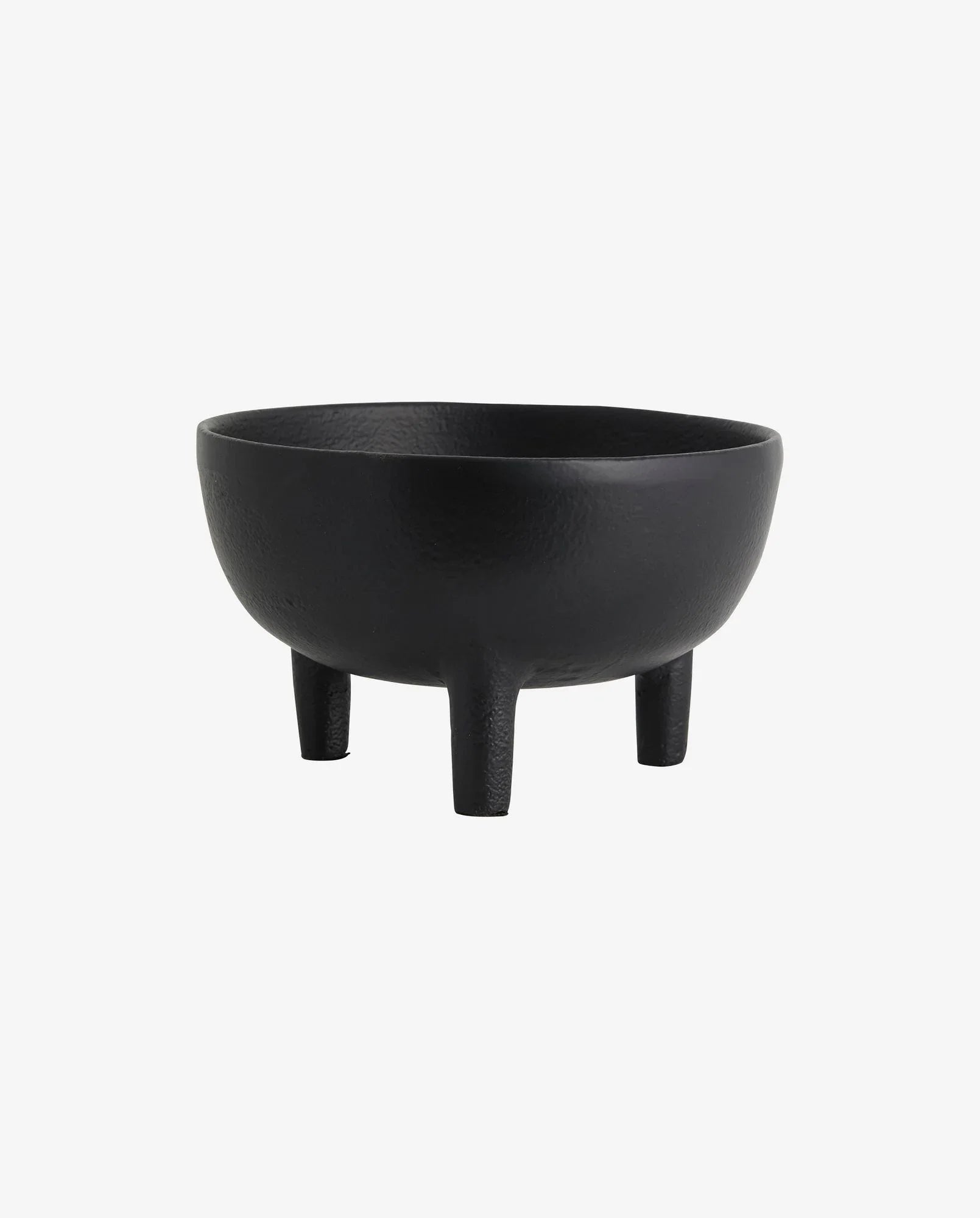 Black textured three-legged bowl on a white background