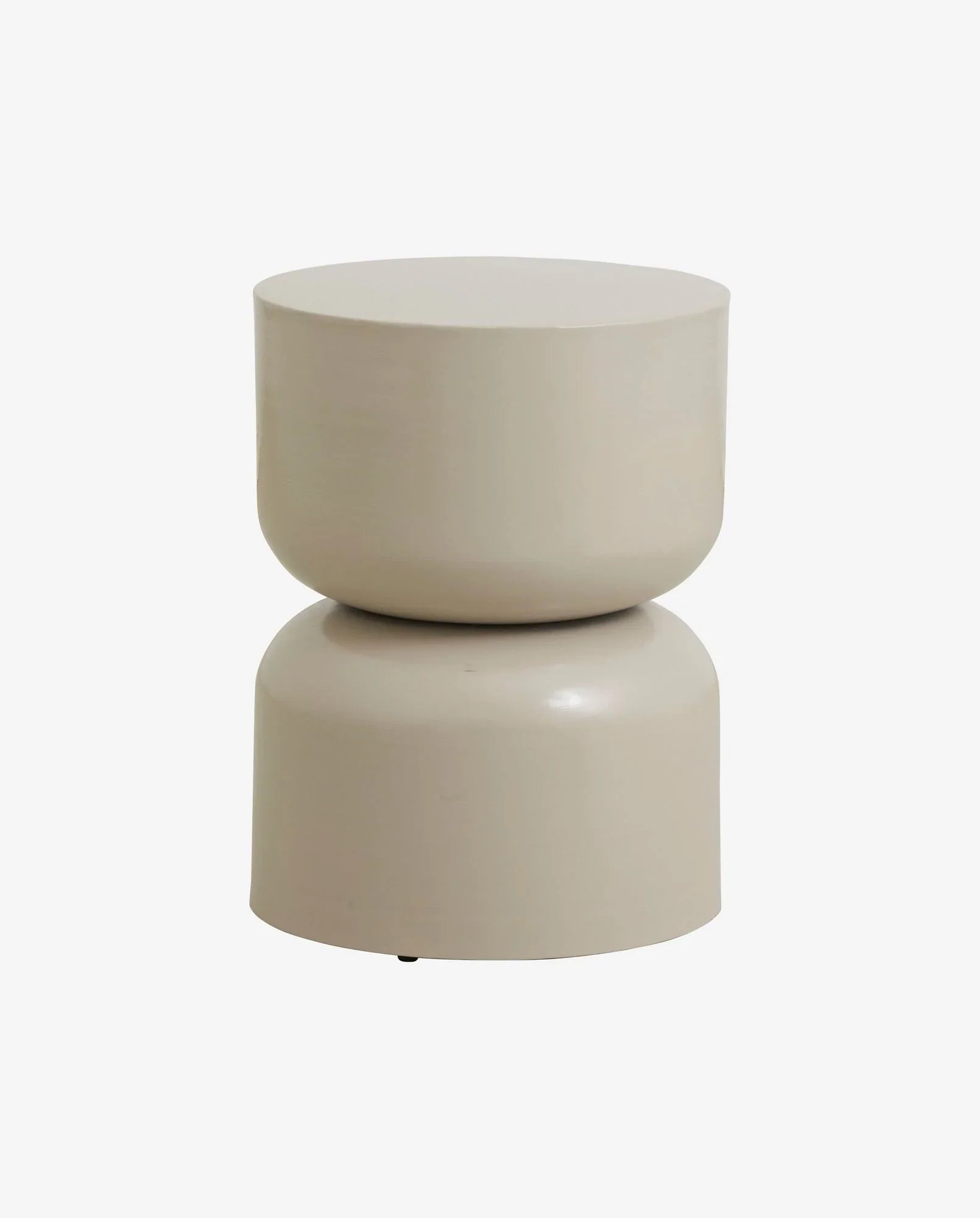 Modern beige ceramic side table with rounded, hourglass shape on white background