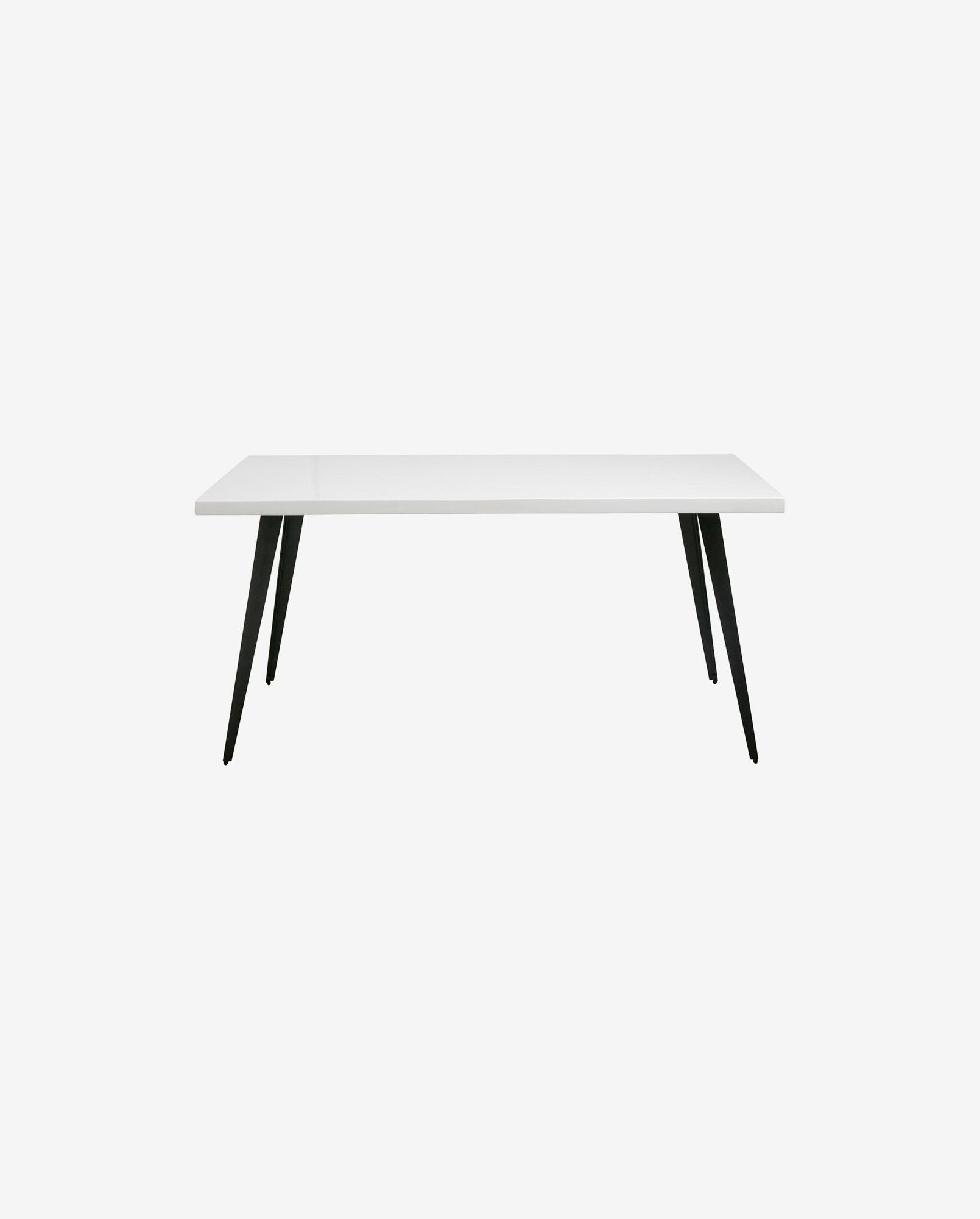 Modern rectangular white dining table with sleek black metal angled legs