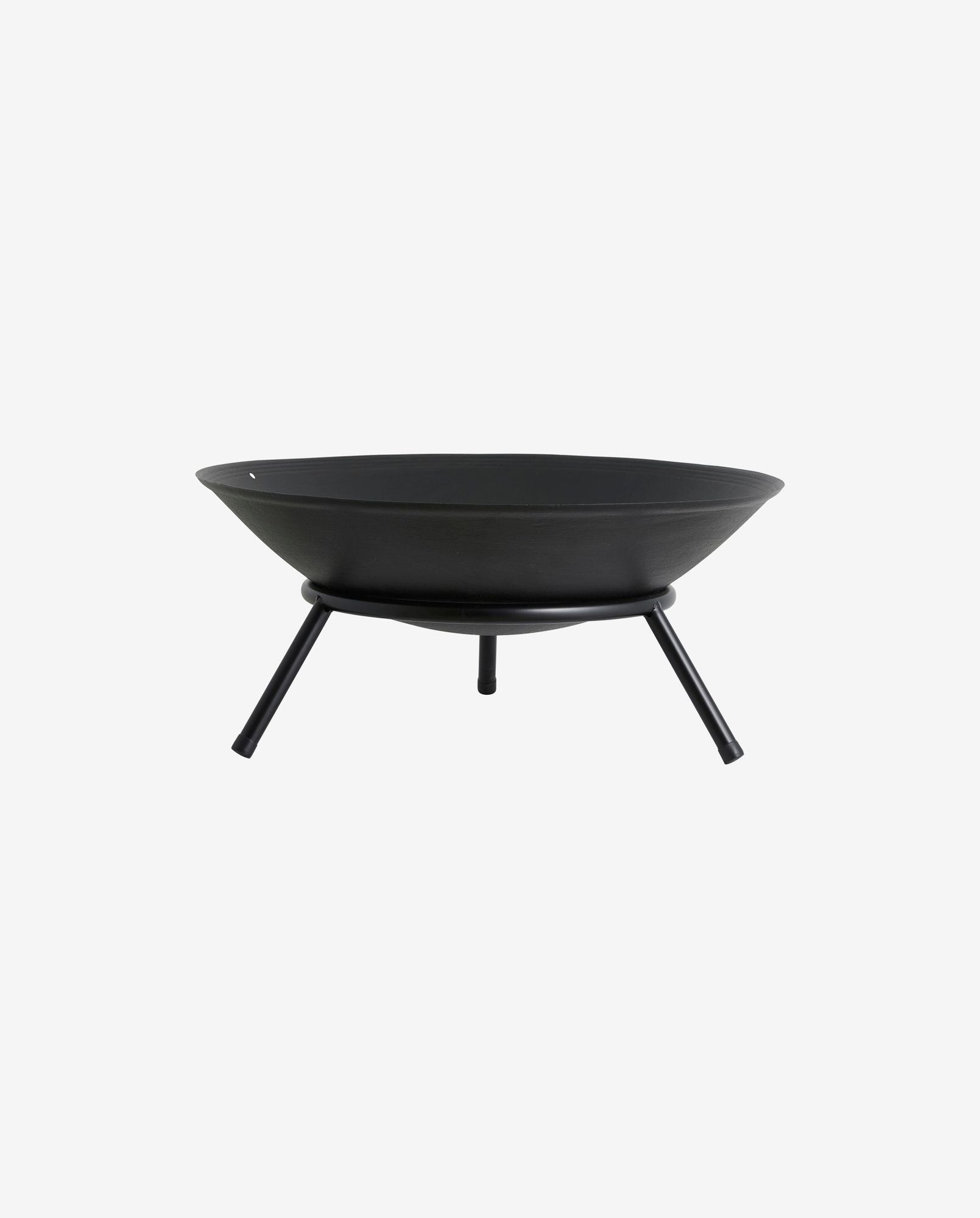 Black metal fire pit bowl with three angled legs on white background