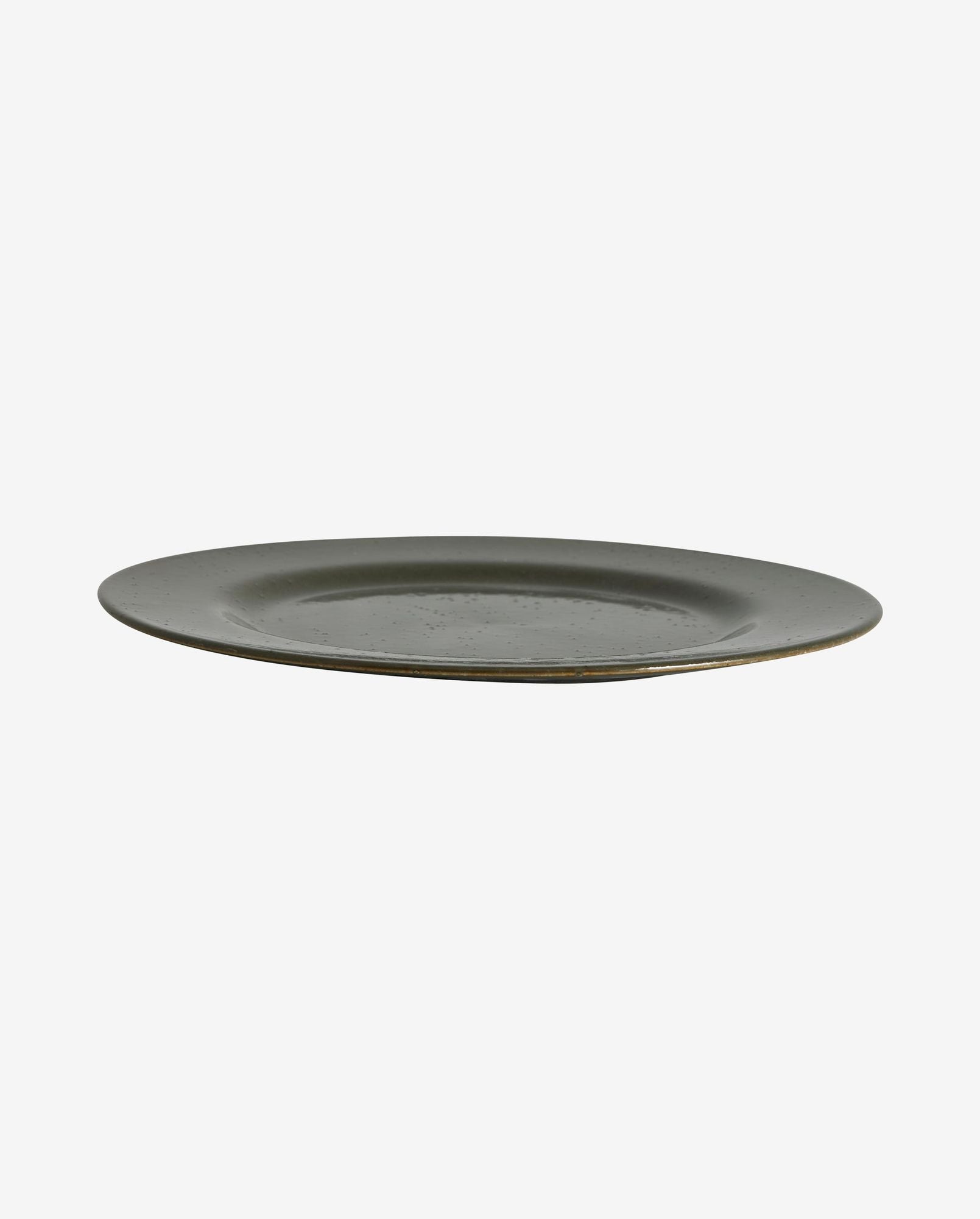 Minimalist dark green ceramic dinner plate with subtle speckled texture on white background