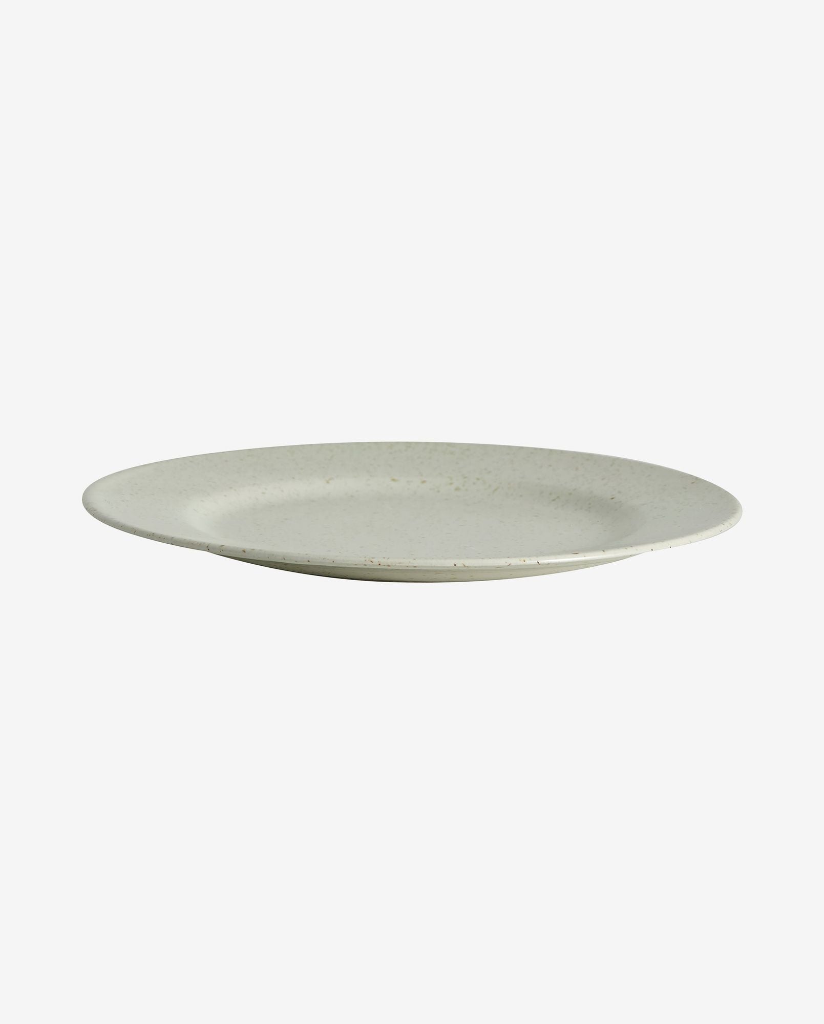 Round speckled beige ceramic dinner plate with a shallow rim on white background