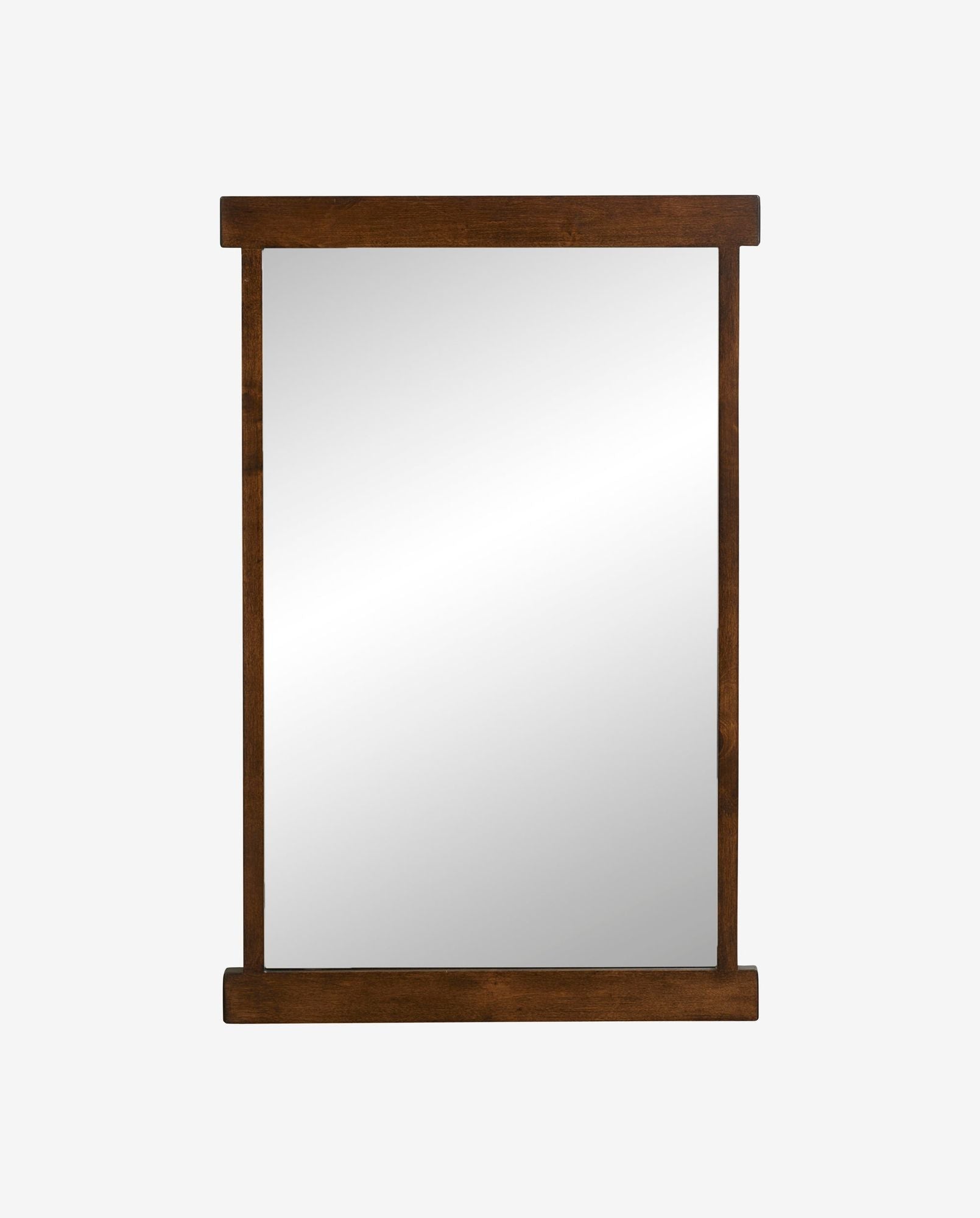 Rectangular wall mirror with dark brown wooden frame against white background
