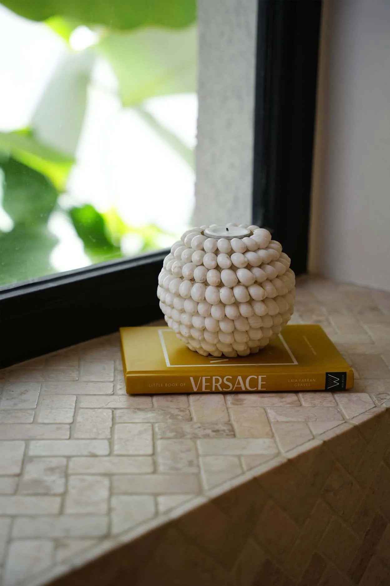 Large candle holder made of shells for taper candles