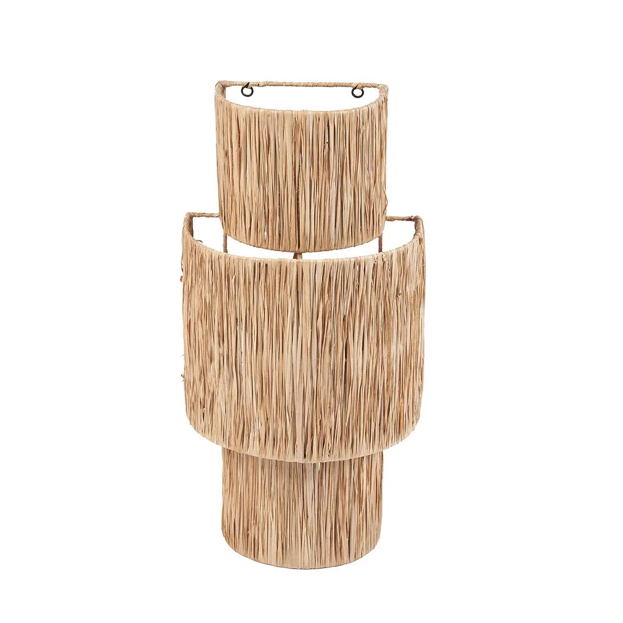 Rustic natural wall light handcrafted from eco-friendly sisal, featuring an organic texture and sculptural shape for warm, earthy interiors.