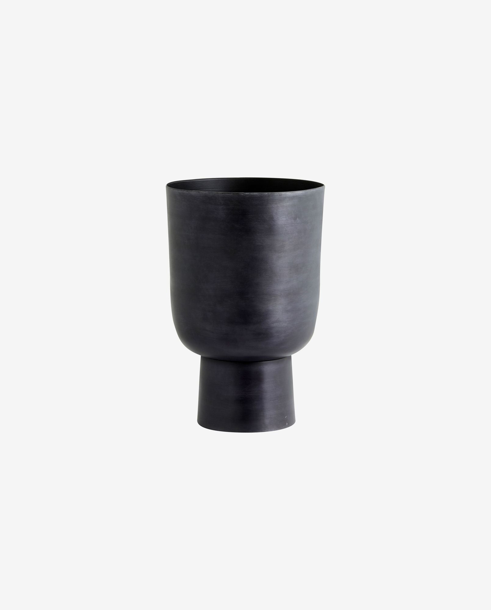 Modern black matte ceramic planter with rounded body and pedestal base on white background