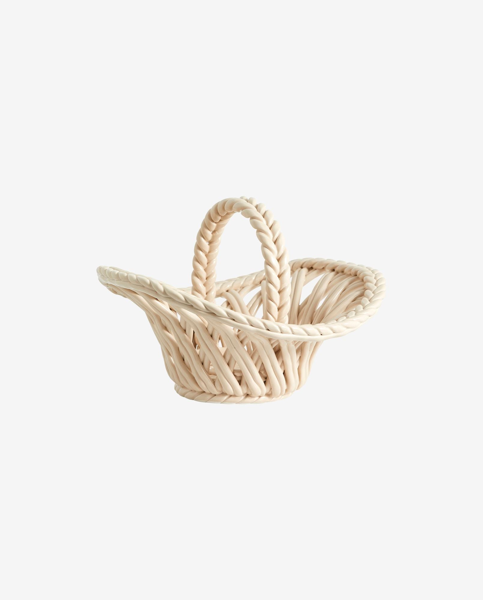 Handwoven cream-colored twisted rope basket with a sturdy handle on white background
