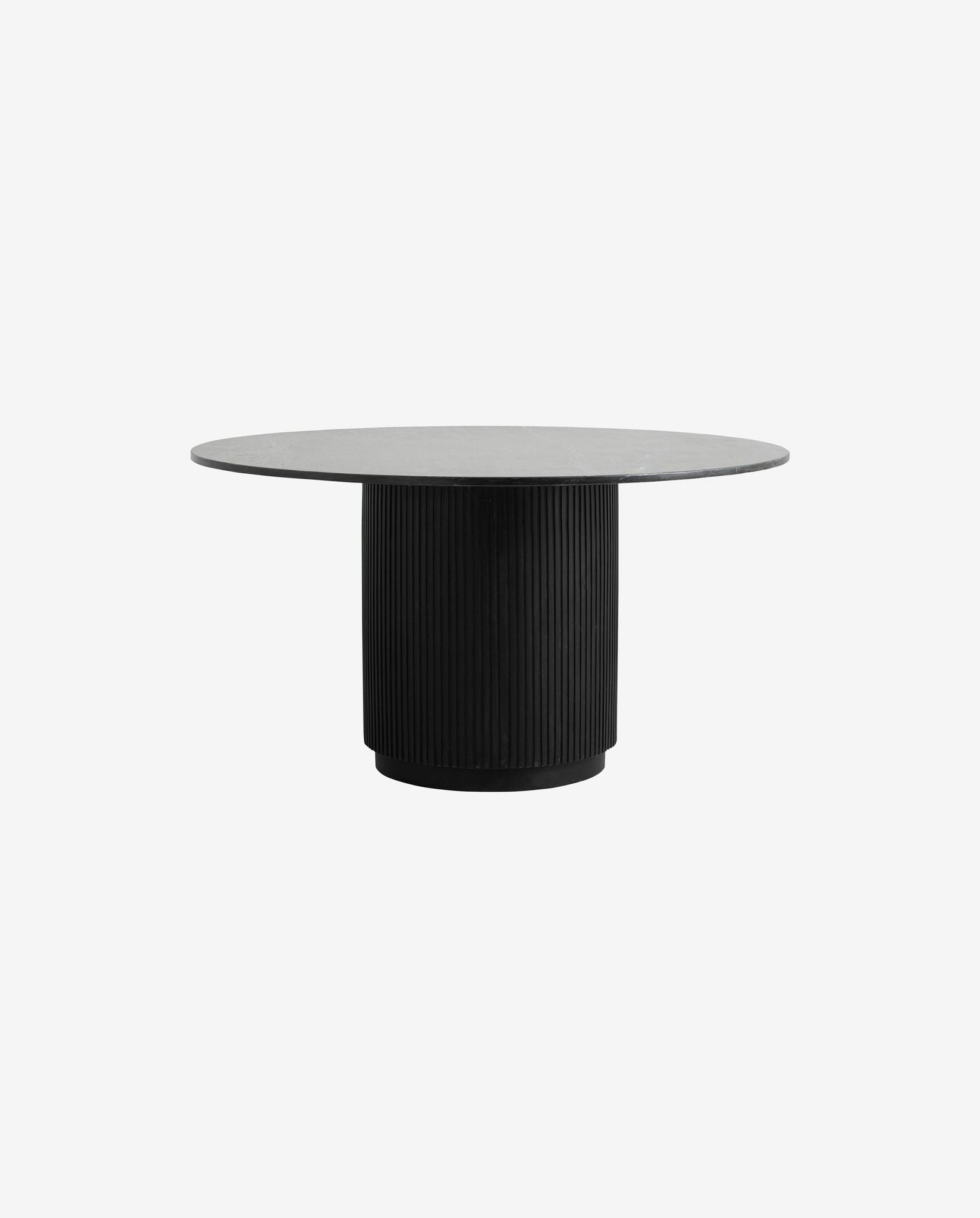 Modern round dining table with black ribbed cylindrical base and dark tabletop