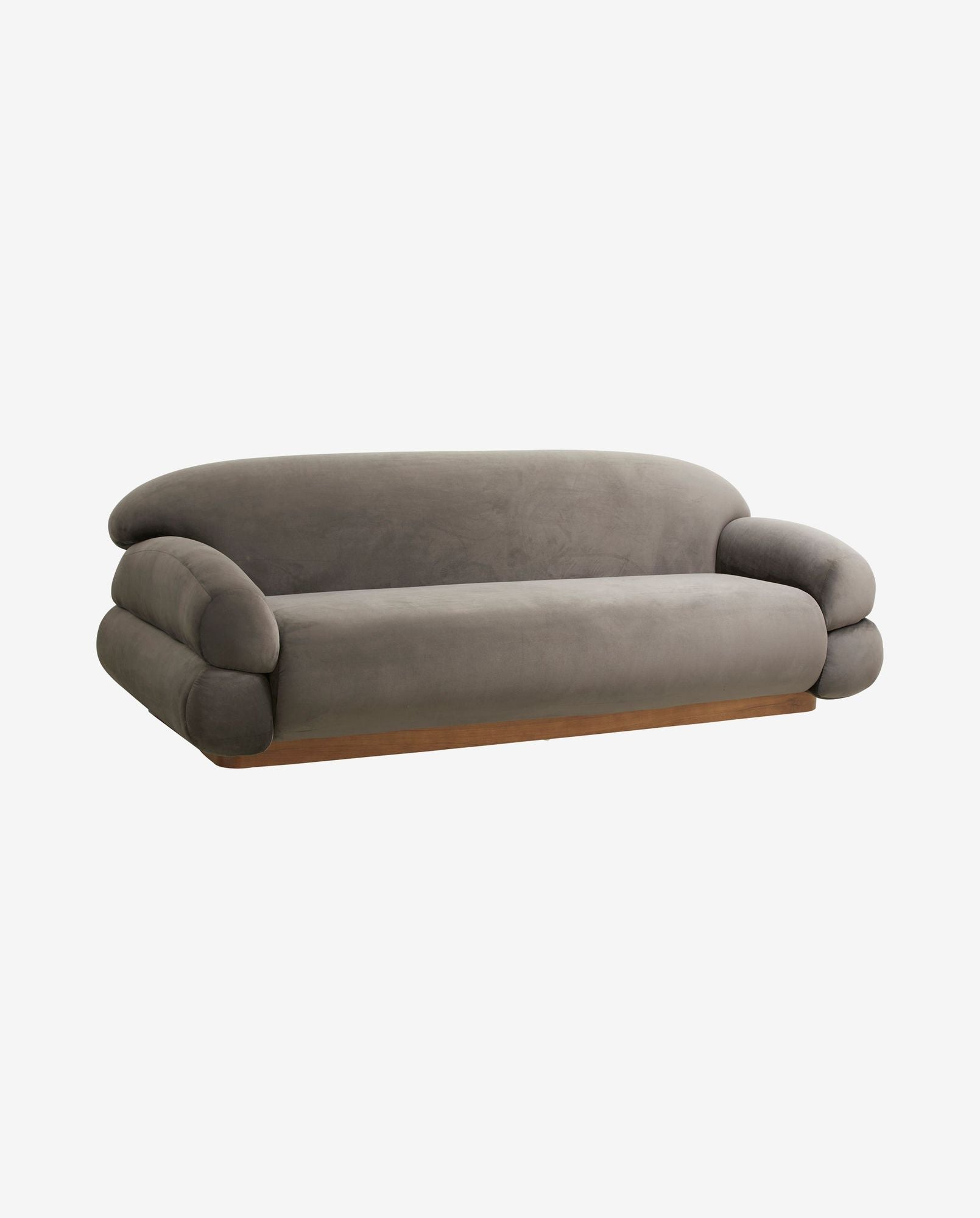 Modern gray velvet sofa with rounded arms and wooden base on white background
