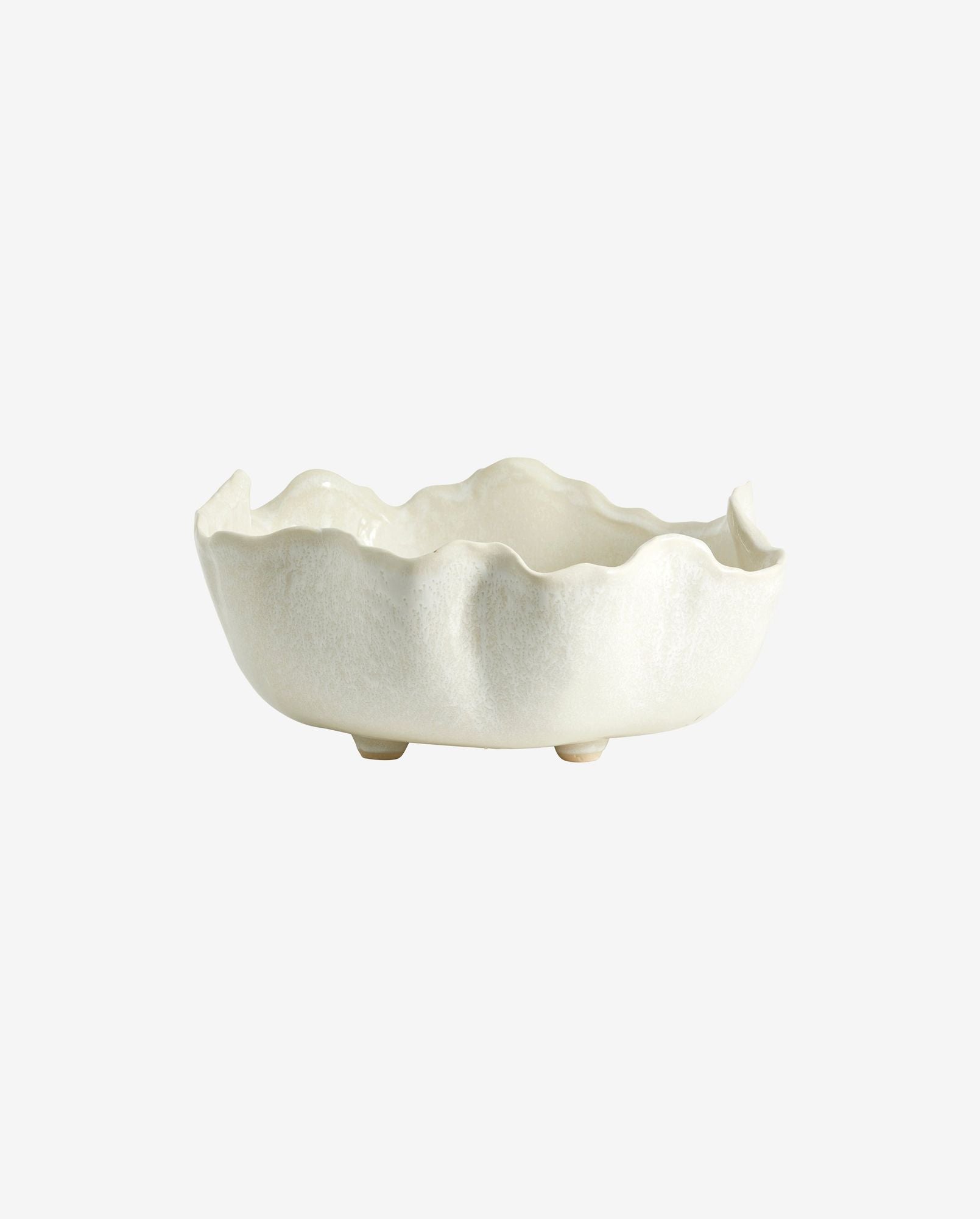 White ceramic bowl with scalloped edges and subtle texture on a white background