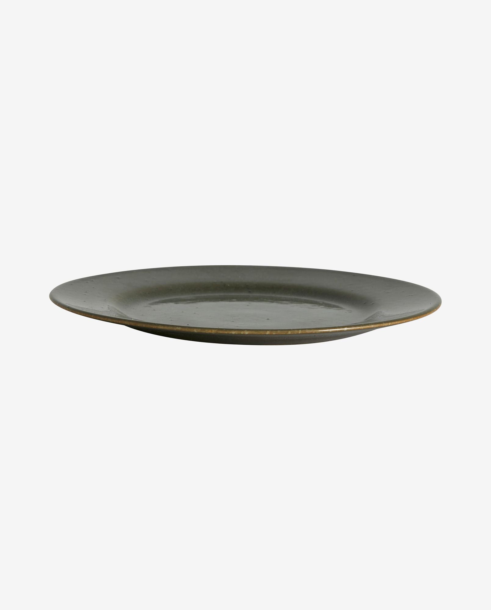 Simple rustic dark ceramic dinner plate with a slightly textured surface isolated on white