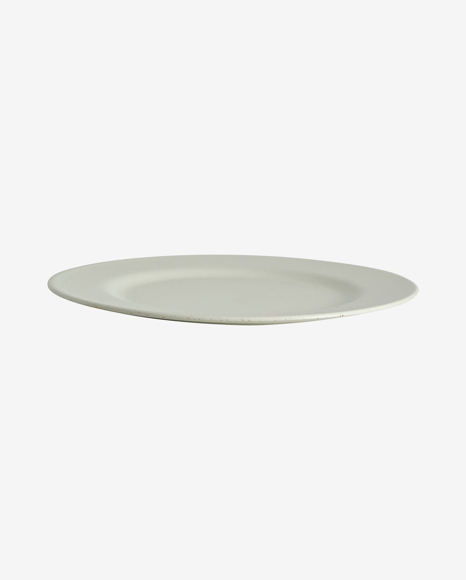Minimalist white ceramic round dinner plate with a subtle textured finish