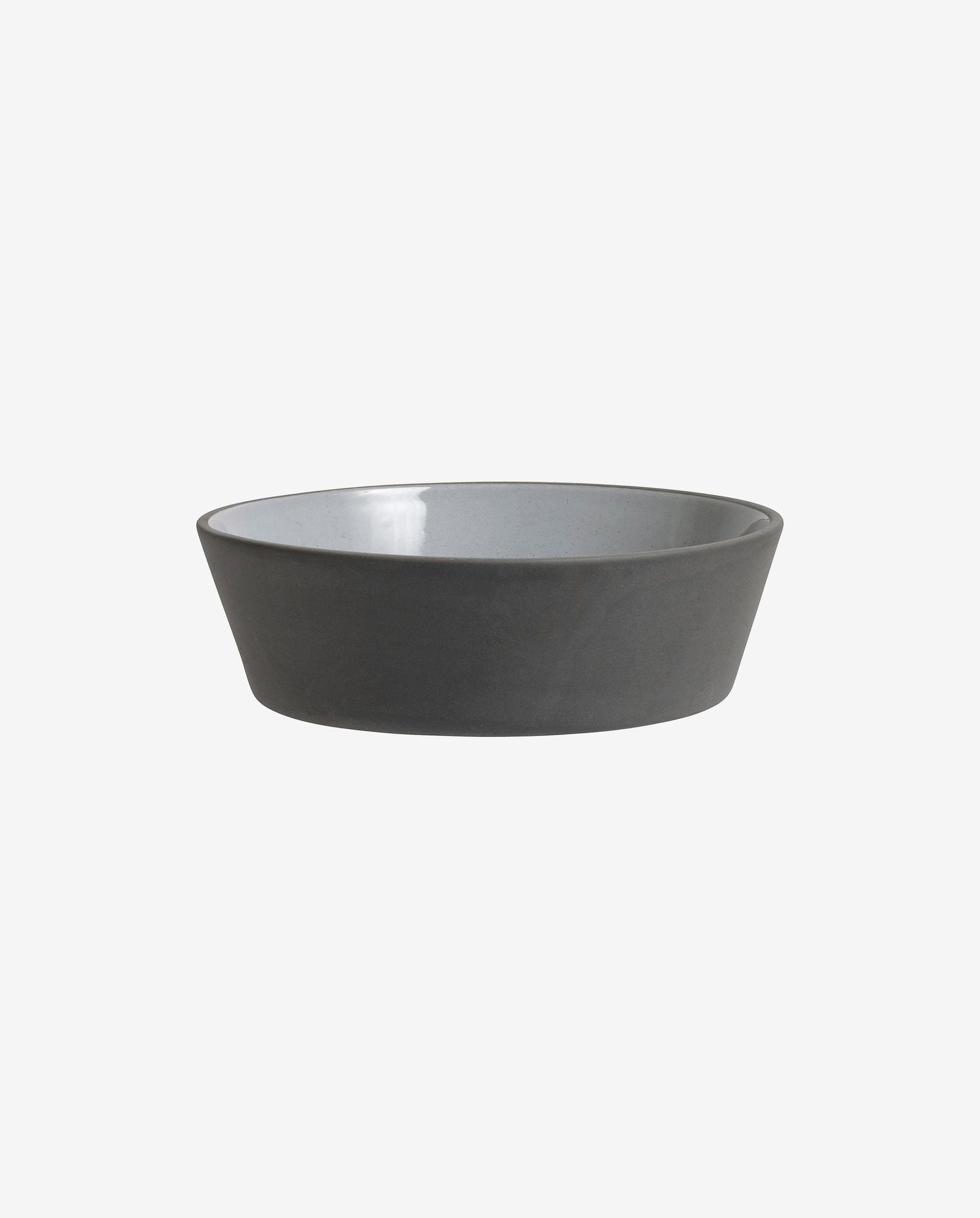 Simple modern ceramic bowl with gray exterior and light gray interior on white background