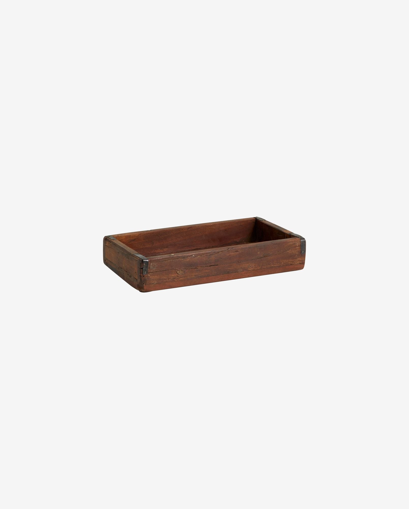 Rectangular vintage wooden tray with metal corner brackets on white background